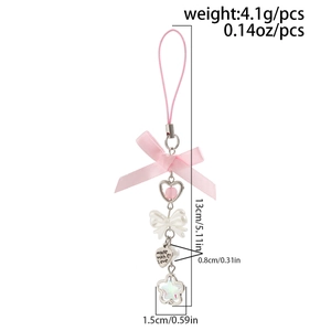 Detail of pink bow pendant with heart beads and engraved made with love metal tag