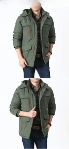 Detail of military green outdoor hooded jacket featuring multiple pockets and embroidery