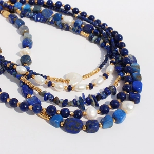 Lapis lazuli and baroque pearl multi-layer beaded necklace with gold accents