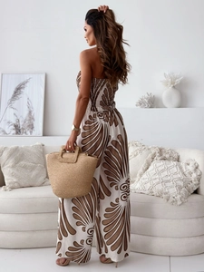 Back view of a chic off-shoulder floral wide-leg jumpsuit with a brown feather print