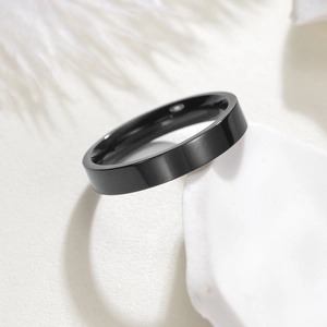 Classic black stainless steel flat band ring with a matte finish for men and women