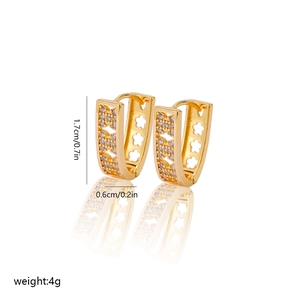 Detailed view of gold V-shaped zircon earrings with size measurements 1.7cm by 0.6cm
