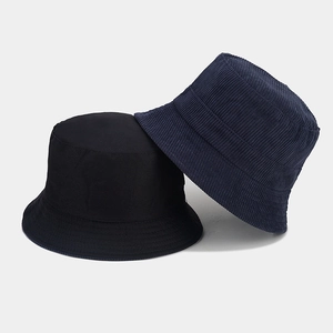 Close-up showing corduroy texture and cotton twill fabric on reversible bucket hats