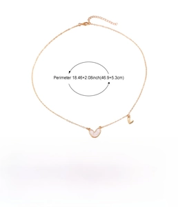 Detail view of rose gold heart pendant necklace with shell texture and size dimensions