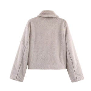 Back view of a short faux fur jacket in light taupe with a soft plush texture