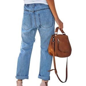 Women's light blue distressed denim jeans with elastic drawstring waist and back pockets
