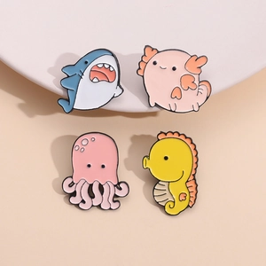 Cute ocean creature enamel pin set featuring shark, jellyfish, and seahorse badges
