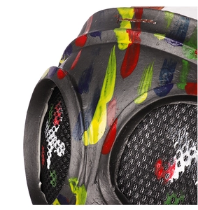 Macro view of steampunk gas mask featuring colorful artistic spray paint and honeycomb mesh