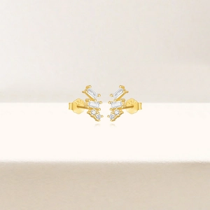 Macro view of gold S925 silver square earrings featuring layered white zircon stones