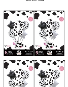 Detail of 40 inch cow print foil number balloons set with star and animal shapes
