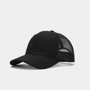 Detailed side view of black trucker hat showing breathable mesh and curved brim