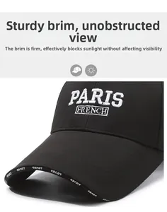 Detail of PARIS FRENCH embroidery and SPORT lettering on black cotton baseball cap