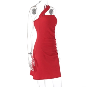 Detail view of red one-shoulder ruched dress with slim fit and asymmetric cut