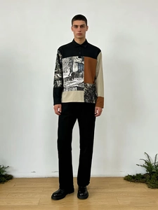 Detail of men's long-sleeve polo shirt with multi-color patchwork and high-quality fabric texture
