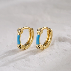 Minimalist 18K gold plated hoop earrings with blue enamel and clear cubic zirconia gems