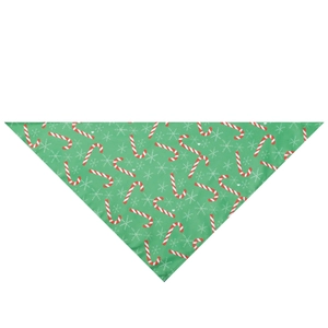 Detailed flat lay of green Christmas pet triangle scarf with candy cane and snowflake patterns