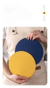 Detailed view of yellow and navy sunflower silicone heat resistant placemats