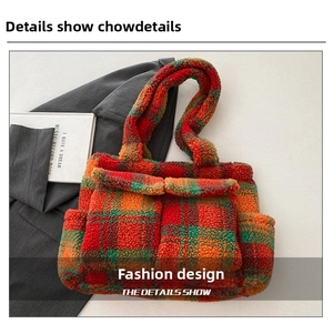 Detail view of plush checkered tote bag with lamb wool texture and front pockets
