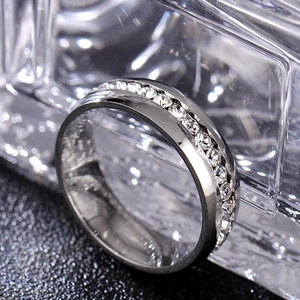 Macro shot of 6mm 316L stainless steel channel set ring with clear sparkling crystals