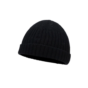Classic black knitted beanie hat for men and women with warm minimalist winter texture