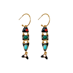 Vintage gold C-shaped hoop earrings with colorful enamel articulated fish pendants