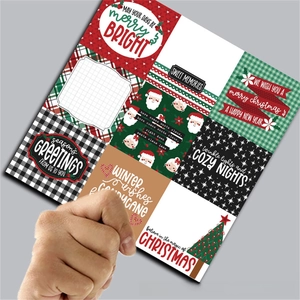 Detail of Christmas vintage scrapbooking paper with red plaid and festive holiday patterns