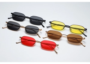 Detailed row of vintage small rectangular sunglasses with colorful lenses and metal frames