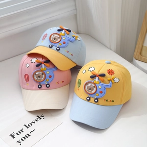 Kids baseball cap featuring cartoon bear airplane design in three pastel color combinations