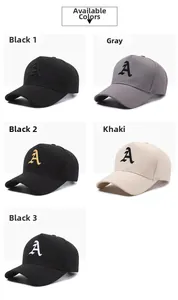 Detail view of cotton baseball caps with embroidered letter A in various colors