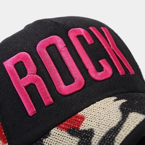 Detailed view of pink ROCK embroidery and camo pattern brim on black baseball cap