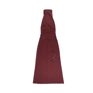 Detailed view of dark red satin dress waist featuring a beaded tie with metallic accents