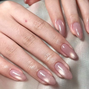 Pink purple cat-eye almond press-on nails with sparkling magnetic gradient effect