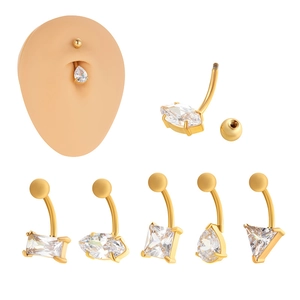 Detailed view of geometric zircon belly rings showing screw thread design and fit