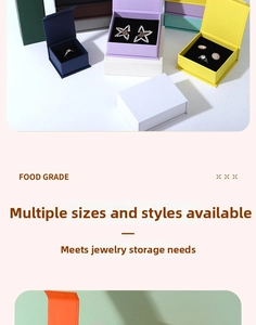 Detailed view of colorful magnetic flap jewelry gift boxes with soft black foam inserts