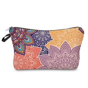 Detail of colorful mandala pattern makeup bag with zipper closure and side handle