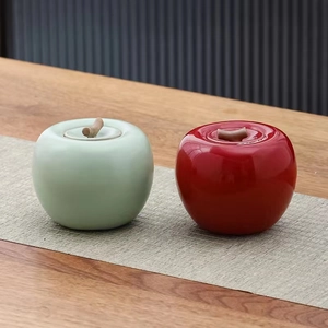 Mini barattoli da tè in ceramica a forma di mela, rosso e verde, finitura lucida