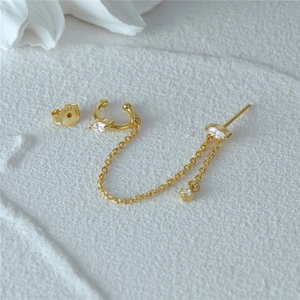 Close-up of S925 sterling silver chain earrings with opal and sparkling cubic zirconia stones