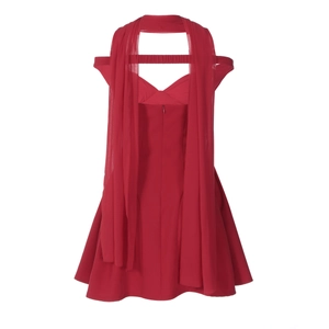 Detail view of red V-neck dress featuring backless design with long chiffon streamers