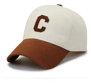 Side view of two-tone cotton baseball cap featuring embroidered C letter and reinforced brim
