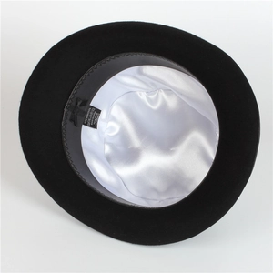 Detail view of 100% wool bowler hat showing premium silk lining and leather sweatband