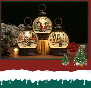 Three bronze vintage Christmas lanterns with internal LED light scenes and hanging rings
