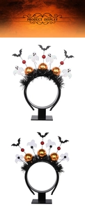 Detail of Halloween headbands with decorative bats, ghosts, and disco ball elements