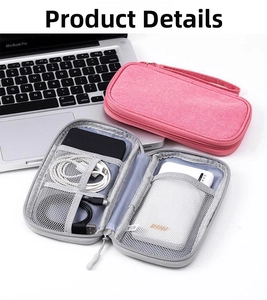 Detail view of pink and grey digital storage bag with mesh pockets and elastic straps