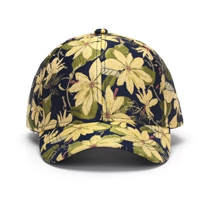 Close-up of floral jacquard fabric texture on a six-panel baseball cap with sun protection