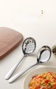 Close-up of SUS 304 stainless steel flat-bottomed soup spoon and slotted ladle set