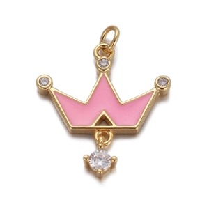 Close-up of golden crown pendant with pink enamel and sparkling clear gemstones