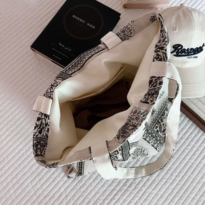 Spacious paisley print cotton canvas tote bag with inner pockets and sturdy handles