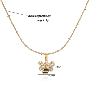 Gold bee pendant necklace with zircon wings and black enamel on 45cm bead chain