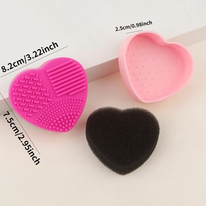 Macro shot of heart-shaped silicone makeup brush cleaner mat and sponge dimensions
