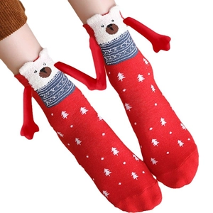 Red Christmas socks with 3D teddy bears, magnetic hands, festive trees and snow patterns